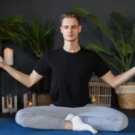 man practicing yoga