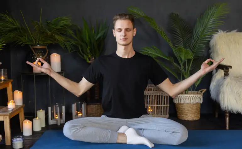 man practicing yoga